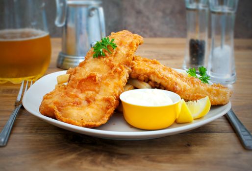 Traditional english fish and chips takeaway meal