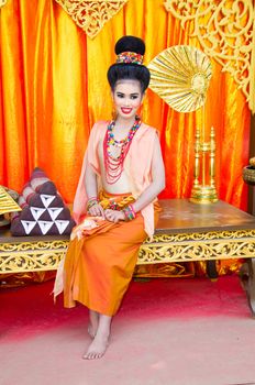 LOPBURI, THAILAND - FEBRUARY 20 : The unidentified model dress period at the historic on The age of King Narai the Great Fair, on February 20, 2014 in Lopburi, Thailand.