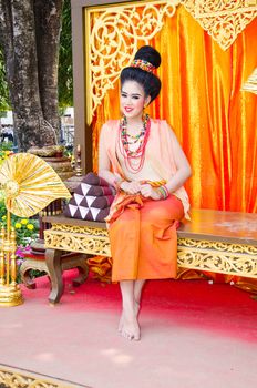 LOPBURI, THAILAND - FEBRUARY 20 : The unidentified model dress period at the historic on The age of King Narai the Great Fair, on February 20, 2014 in Lopburi, Thailand.