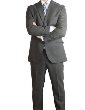 Man in suit standing with the cross arms. Crop