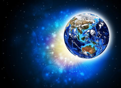 Earth planet in sun rays. Elements of this image are furnished by NASA