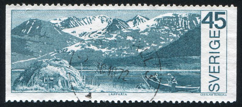 SWEDEN - CIRCA 1970: stamp printed by Sweden, shows Boat on mountain lake in Stora Sjofellet National Park, circa 1970