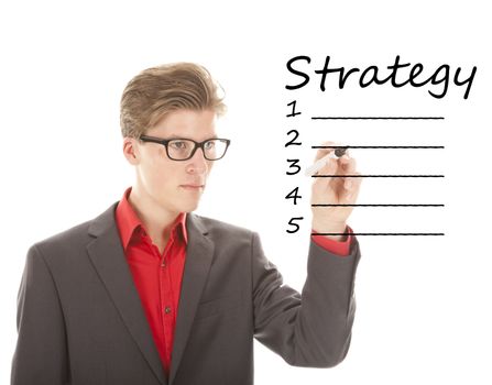 Young man writing strategy on white isolated background