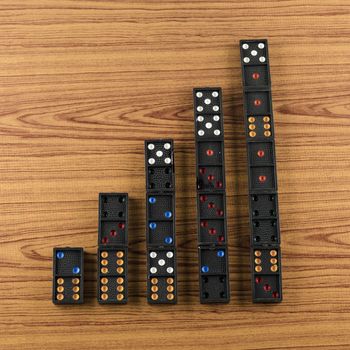 black domino on wooden background