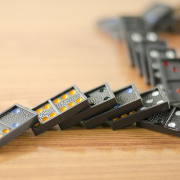 black domino on wooden background