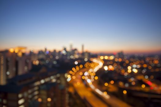Ampang Kuala Lumpur Elevated Highway AKLEH with City Skyline in Malaysia at Twilight Blurred Defocused Bokeh Background