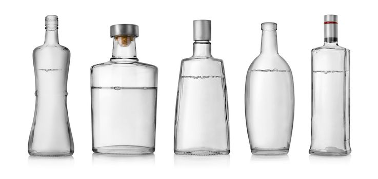 Collage of bottles of vodka isolated on a white background