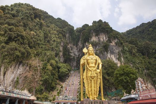Lord Murugan Hindu Deity Statue at Batu Caves in Malaysia