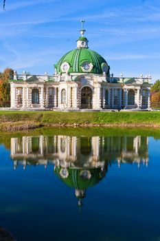 Grotto pavilion with beautiful reflection in park Kuskovo, Moscow, Russia