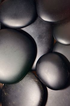 A Black stones background lighted by flash