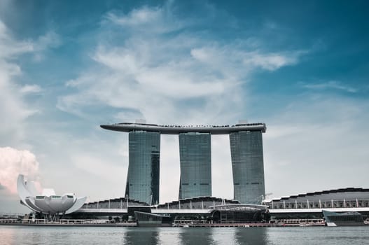 SINGAPORE-MARCH 31: The Marina Bay Sands Resort Hotel on Mar 31, 2011 in Singapore. It is an integrated resort and the worlds most expensive standalone casino property at S$8 billion.