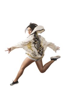 Energetic dance jump over white background