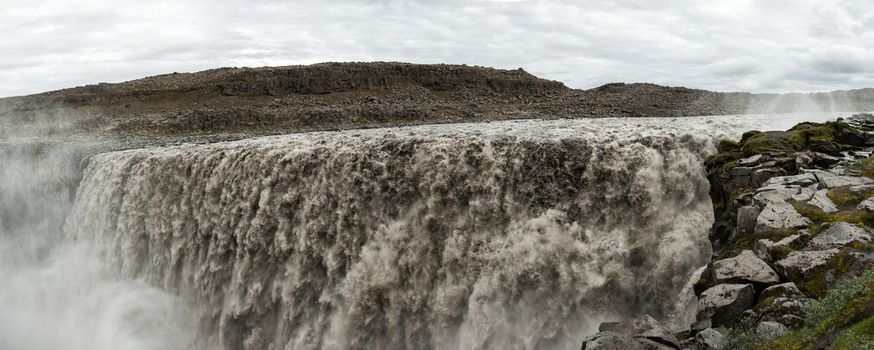 Dettifoss is the most powerful waterfall on Iceland and in the whole Europe. It is located in Jokulsargljufur National Park the northeasten Iceland on the river Jokulsa a Fjollum. Panorama