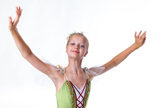Portrait of beautiful young ballerina on a white background