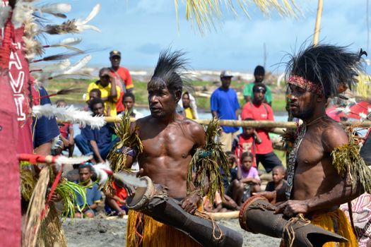 Traditional tribal dance at mask festival.
7th Gulf Mask Festival, Toare Village, Gulf Province, Papua New Guinea on June 19, 2011