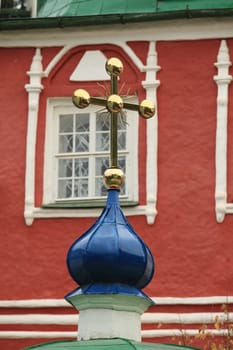 golden crosses on the church dome