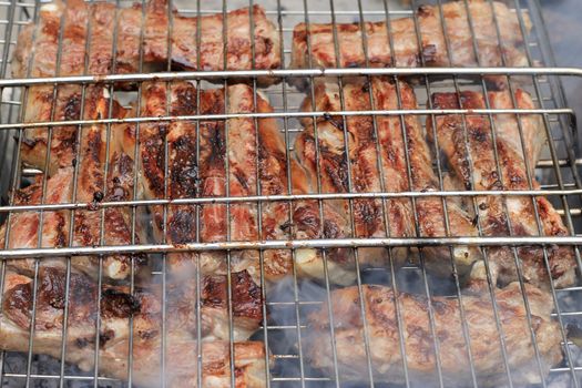 Barbeque fried on the bonfire and coals