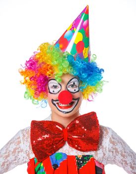 Portrait of a cute girl clown. Isolated on white background.