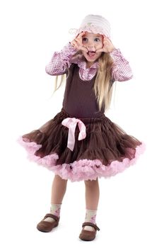 Shot of emotional little girl with long blond hair in studio