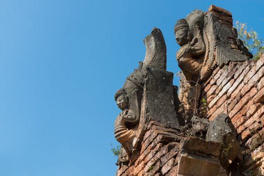 Details of ancient Burmese Buddhist pagodas Nyaung Ohak in the village of Indein on Inlay Lake in Shan State, Myanmar (Burma).