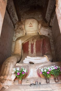 Buddha image in ancient Burmese Buddhist pagodas Nyaung Ohak in the village of Indein on Inlay Lake in Shan State, Myanmar (Burma).