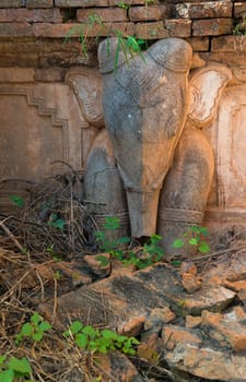 Elephant image on ruins of ancient Burmese Buddhist pagodas Nyaung Ohak in the village of Indein on Inlay Lake in Shan State, Myanmar (Burma).