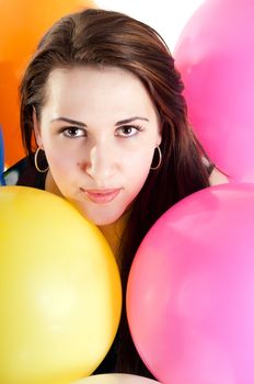 Shot of beautiful woman with multicolored air balloons