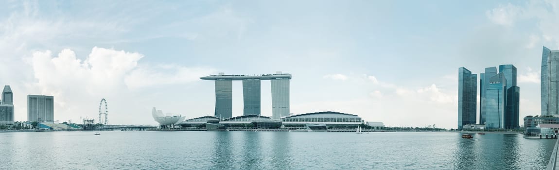 Singapore skyline of business district and Marina Bay in early morning light