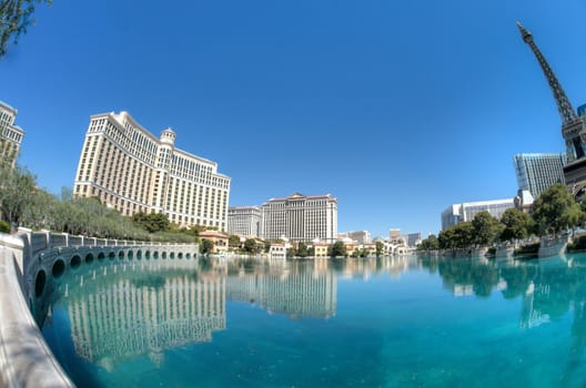 Las Vegas hotels reflecting in water. Fisheye lens used to capture extra wide angle.