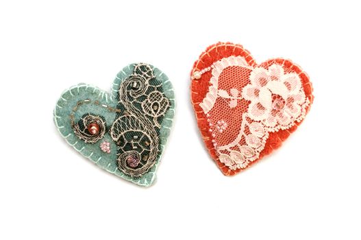 handmade textile heart on a white background