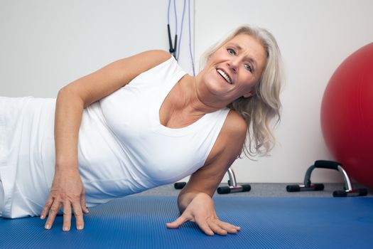 An image of a mature woman doing fitness