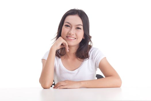 Asian woman isolated on white background. white t-shirt, sit on chair with table