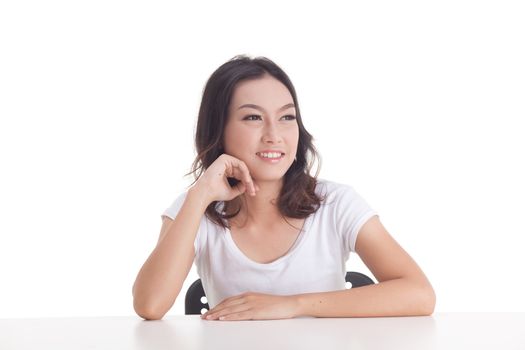 Asian woman isolated on white background. white t-shirt, sit on chair with table