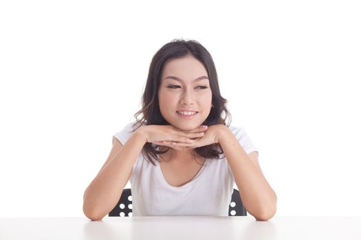 Asian woman isolated on white background. white t-shirt, sit on chair with table