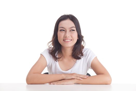 Asian woman isolated on white background. white t-shirt, sit on chair with table