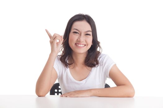 Asian woman isolated on white background. white t-shirt, sit on chair with table