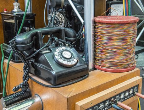 An old black telephone in the Royal Danish Post Museum. Copenhagen, Denmark