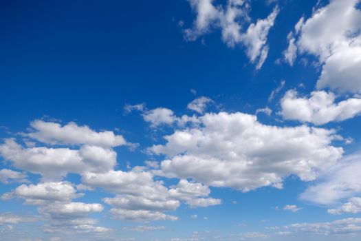 Blue sky and cloudscape with cumulus clouds