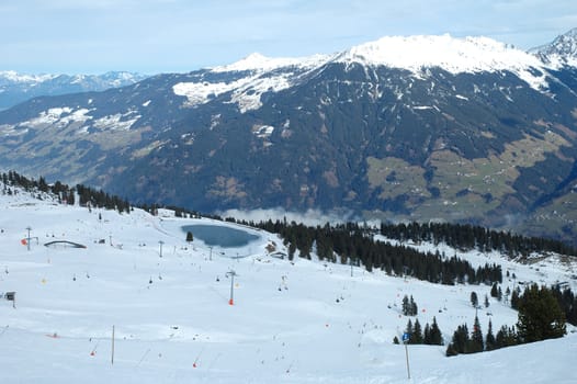 Slopes in Alps nearby Kaltenbach in Zillertal valley in Austria