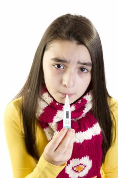 ill girl child worried with thermometer