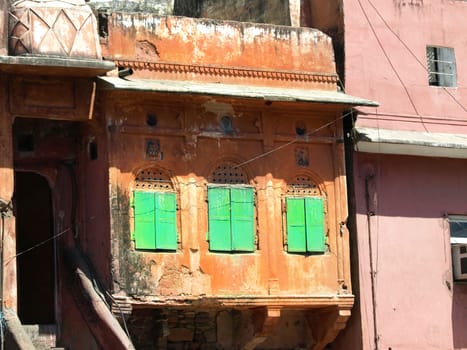 old red house with green windows in Jaipur,India    