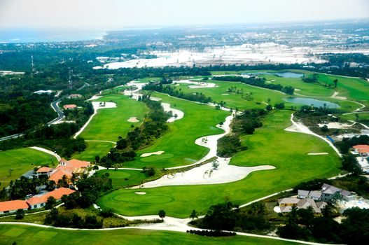 Flying above a golf course at an exotic destination