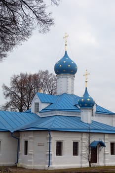 White orthodox church with blue domes
