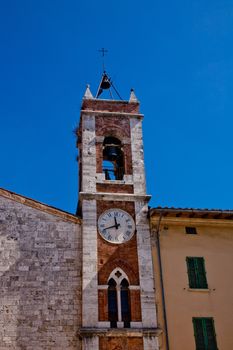 An old big medieval tower in San Quirico d'Orcia
