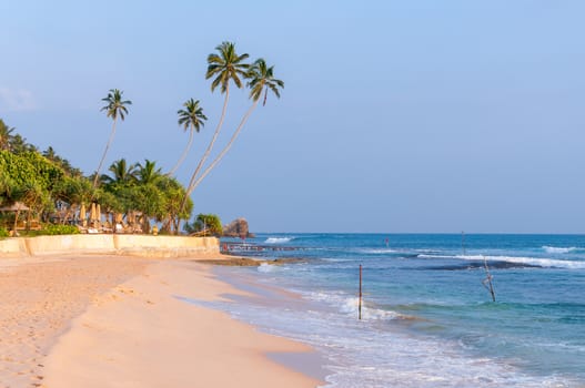 Tropical beach in southern part of Sri Lanka at sunset