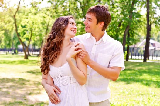 couple hugging in the park, have a good time together