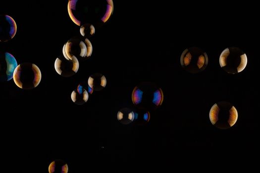 a bunch of color Soap bubbles on black background