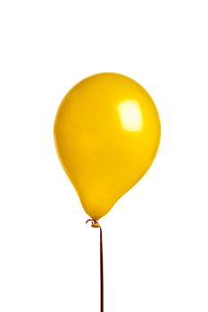 Yellow balloon isolated on white with red string