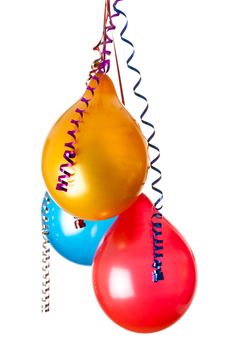 colored balloons isolated on white with hanging holiday streamers