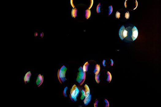 a bunch of color Soap bubbles on black background